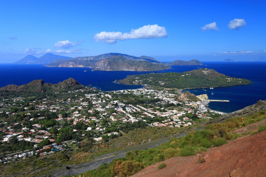 Dove dormire a Lipari: guida alle zone — Vulcano island (Sicily, Italy) - View from the volcano slopes towards the village and the Eolian islands
